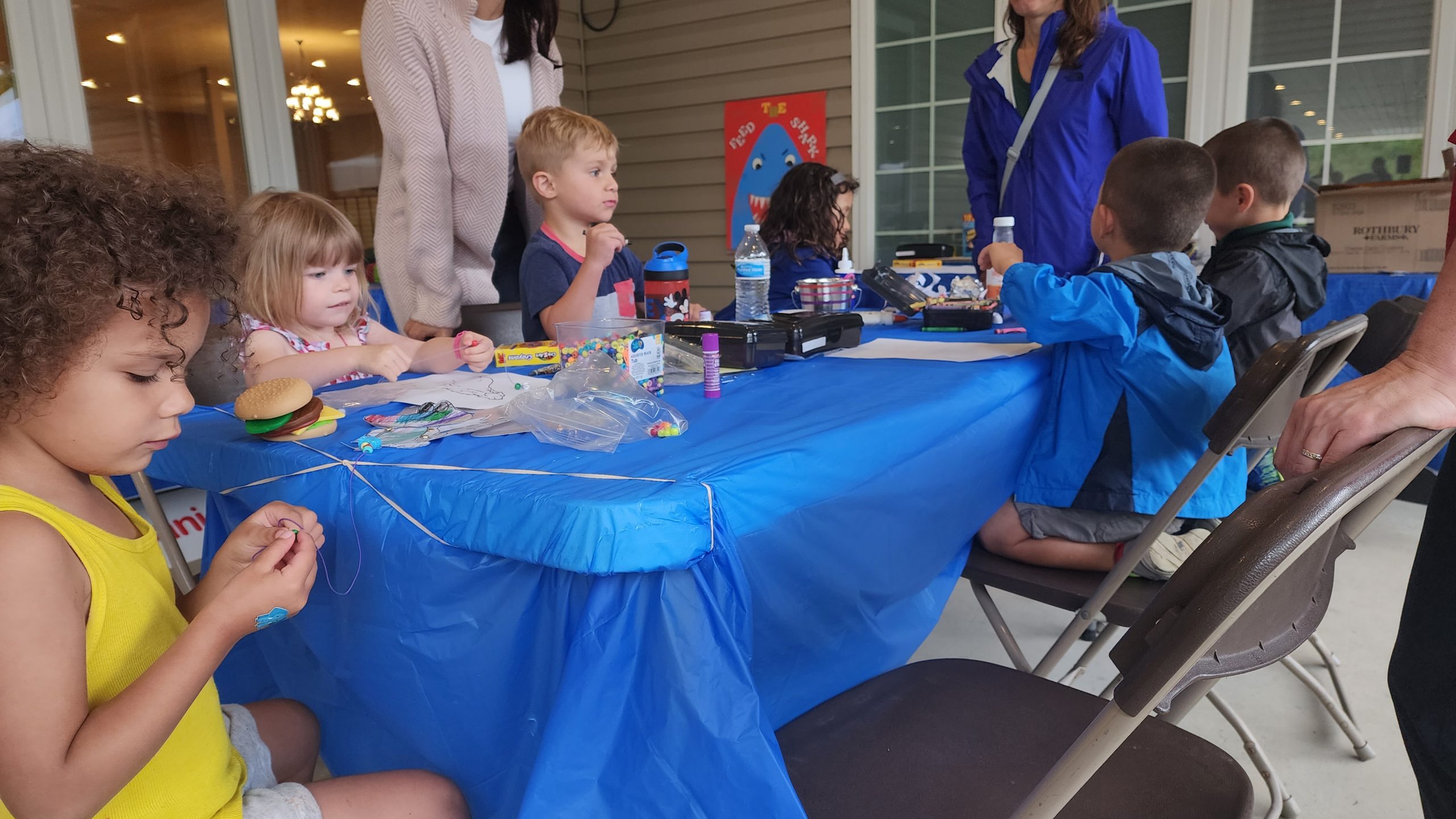 Children sitting around table at Youth Services at bible based church, Family Church Jamestown